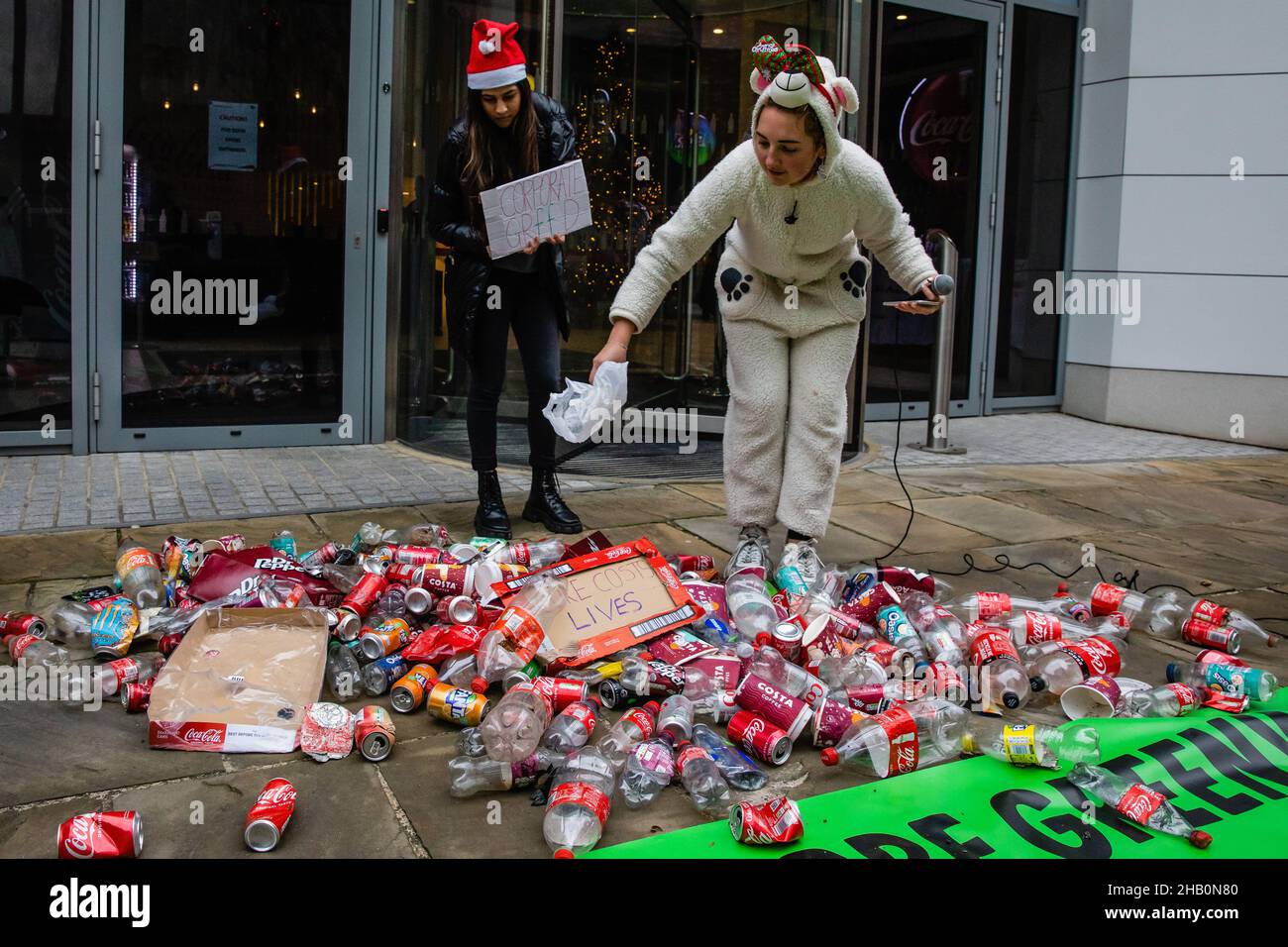 Protesting Coca Cola London, UK. 15th December, 2021. Climate activists from Extinction ...