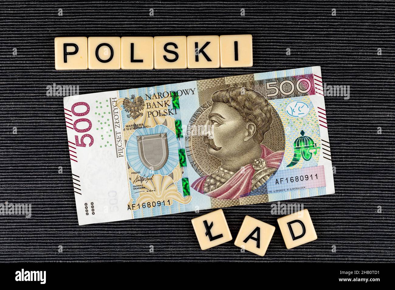 The sentence "Polski Ład" translated as "Polish Order" and single Polish 500 PLN banknote on