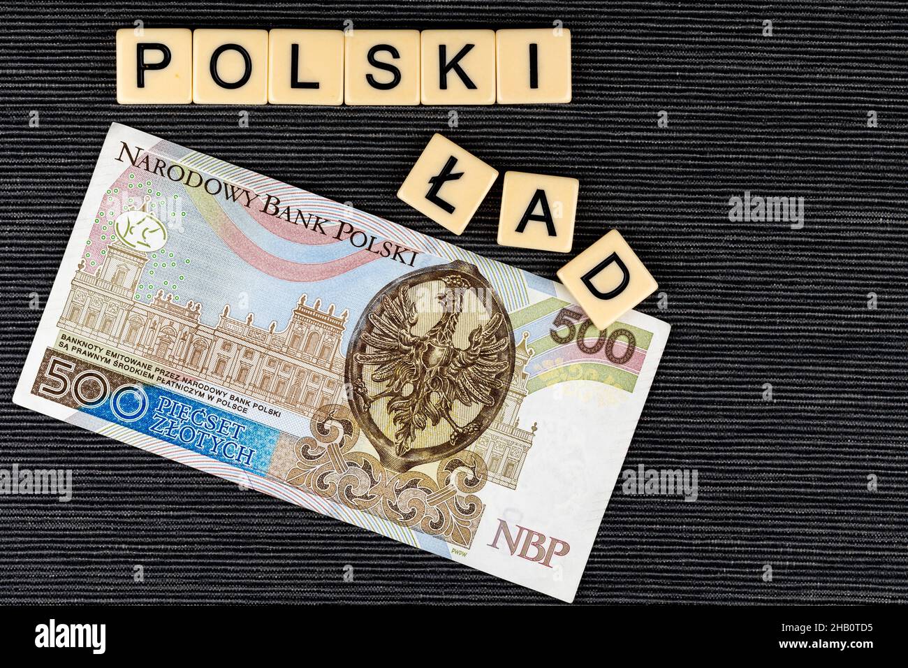 The sentence "Polski Ład" translated as "Polish Order" and single Polish 500 PLN banknote on