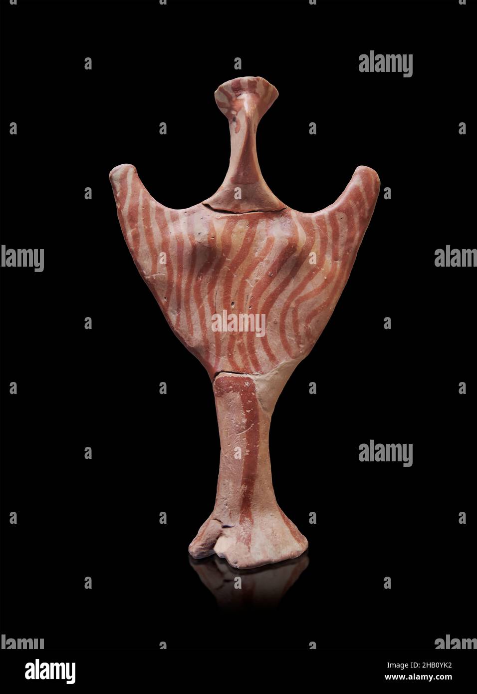 Mycenaean female figurine, Psi type, 1350-1300 BC. Mycenae archaeological site Museum, Greece. From the Petas House Group, Room F. Ref LH IIIA2.  The Stock Photo