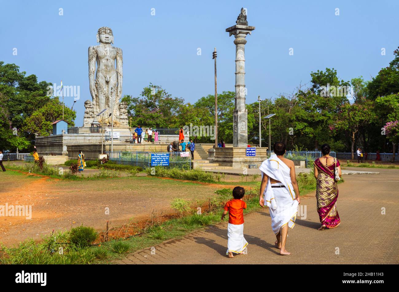 Dharmasthala, Karnataka, India Pilgrims walk towards the 12 m high