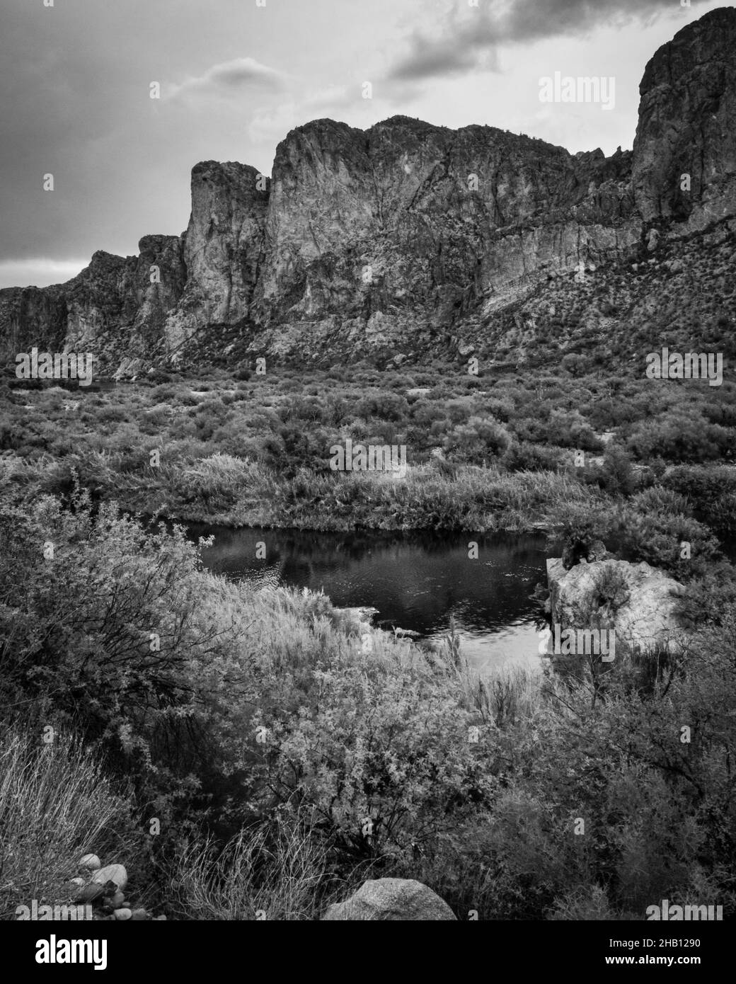 Black and white Bulldog Cliffs of Goldfield Mountains in Lower Salt River, Arizona. View from Water Users Recreation Site. Stock Photo