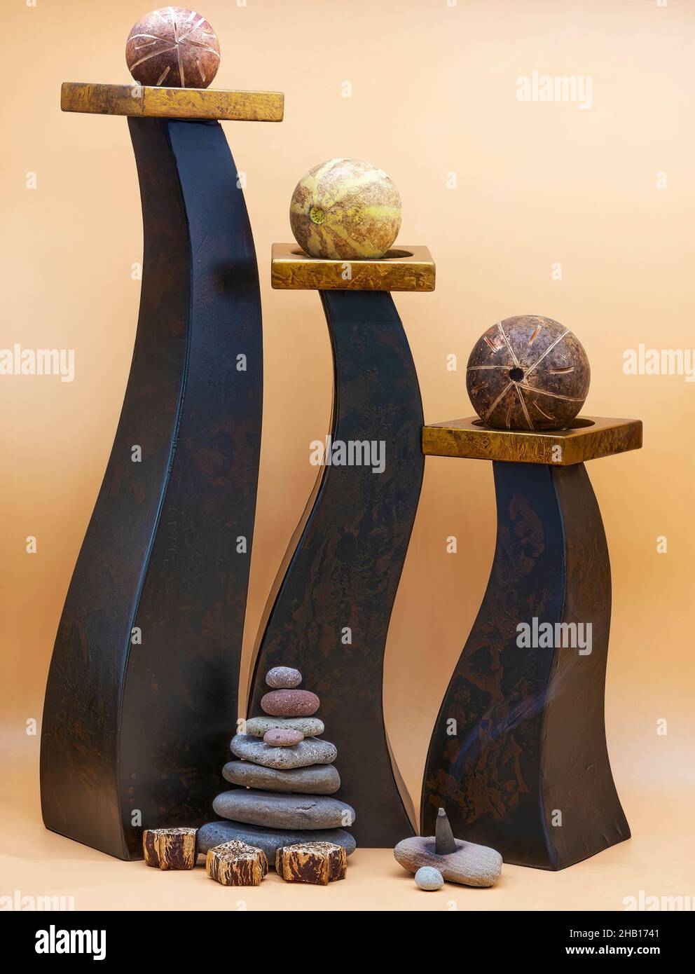 Zen still life with shapes, stacked rocks, incense, to instill tranquility. Stock Photo