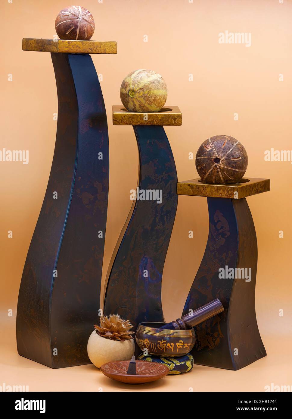 Zen still life with shapes, incense, singing bowl all to instill tranquility. Stock Photo