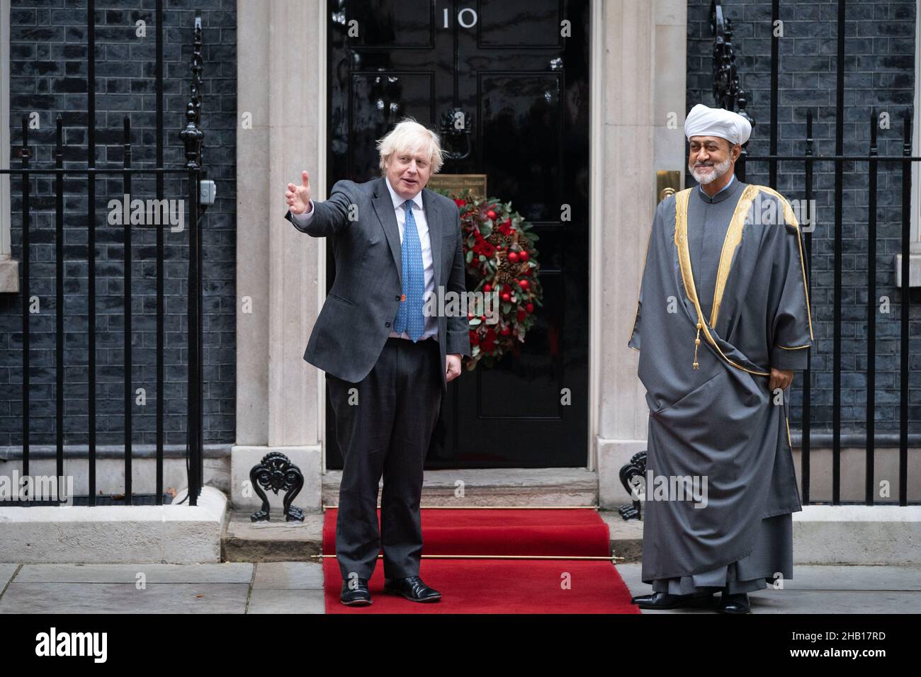 Prime Minister Boris Johnson greets the Sultan of Oman Haitham Bin Tarik Al Said outside 10 Downing Street, central London. Picture date: Thursday December 16, 2021. Stock Photo