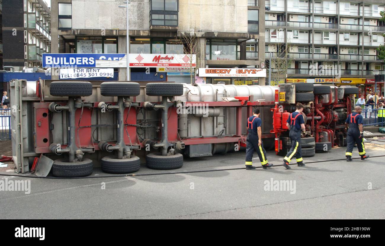 Emergency Services On Scene at a Road Traffic Accident in Central London Involving an Overturned Truck Stock Photo