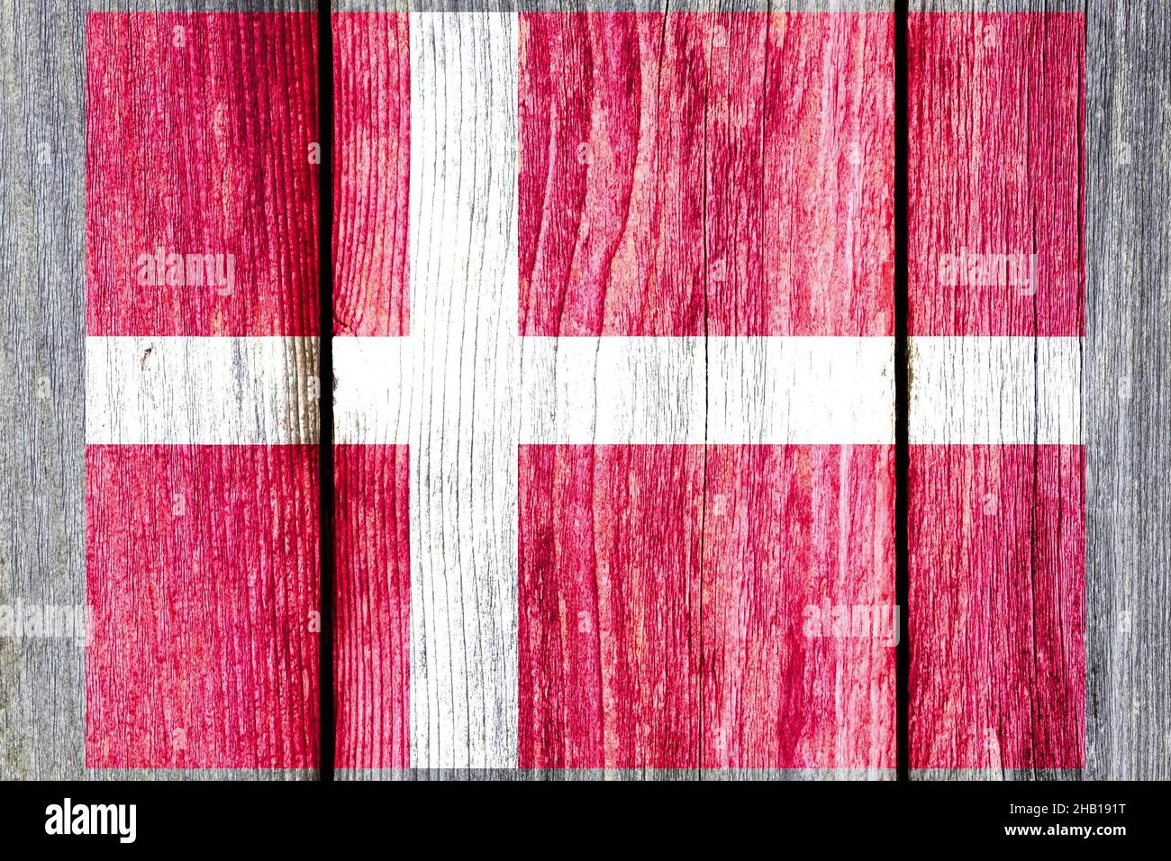 Grunge pattern of Denmark national flag isolated on weathered wooden ...
