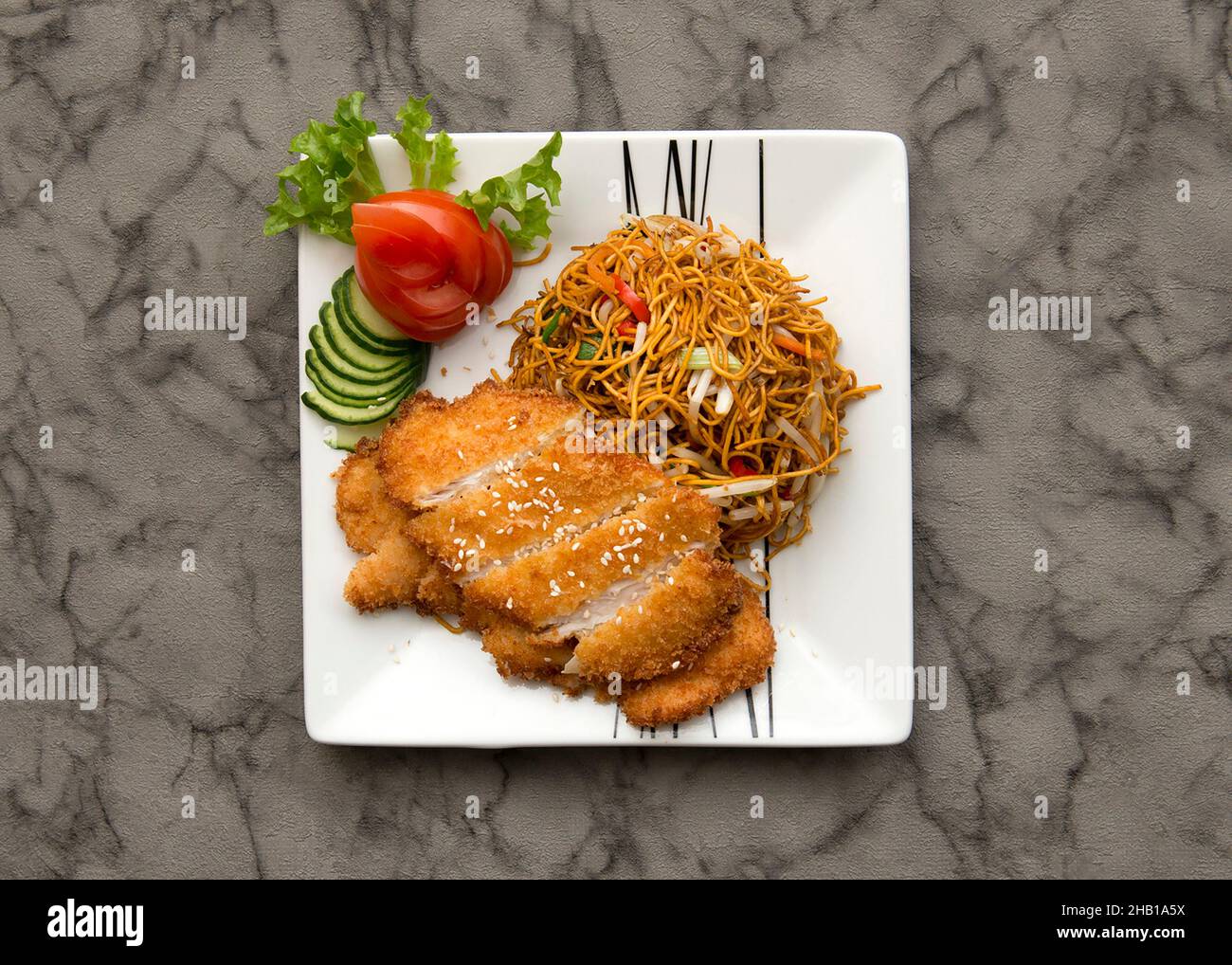 Katsu Chicken with thin egg noodles...Japanese, Thai, Chinese, Korean, Mongolian and Oriental food. Stock Photo