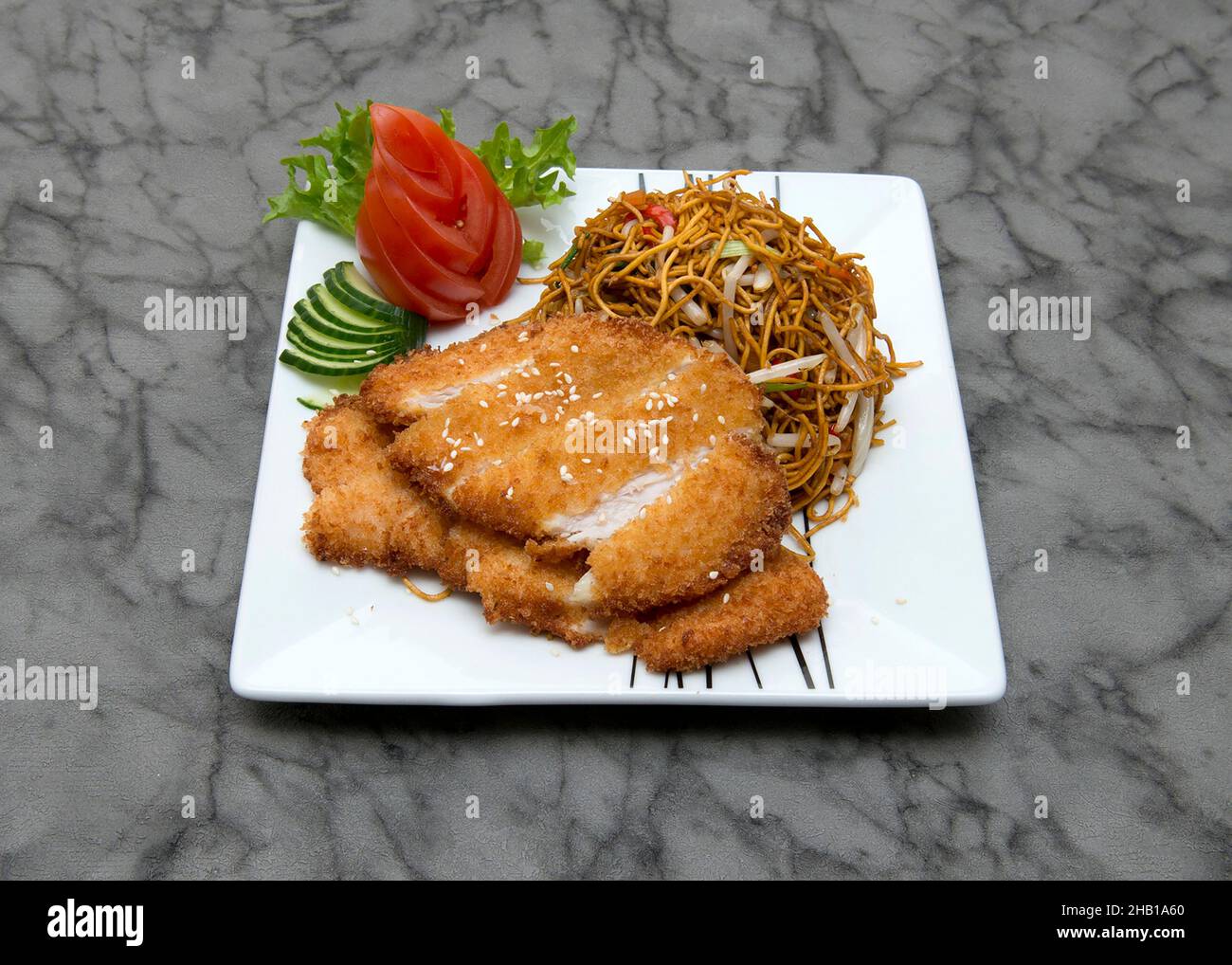 Katsu Chicken with thin egg noodles...Japanese, Thai, Chinese, Korean, Mongolian and Oriental food. Stock Photo