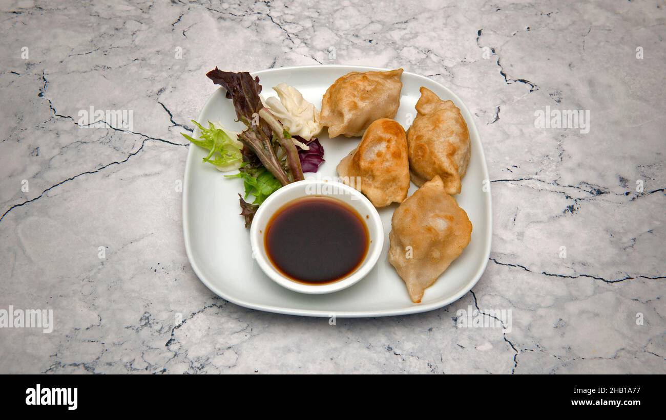 Pork Guo Thai dumplings...Japanese, Thai, Chinese, Korean, Mongolian and Oriental food. Stock Photo