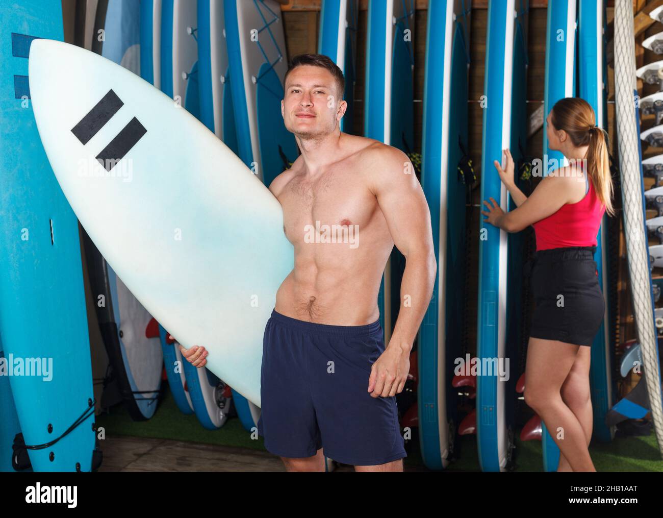 guy is standing with surfboard Stock Photo