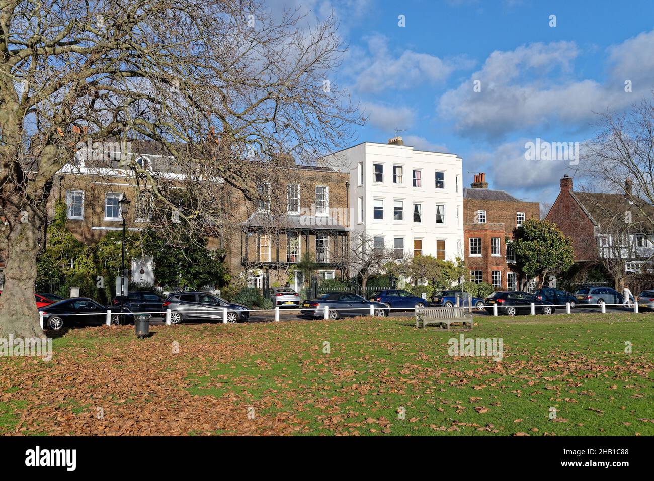 Exclusive private residential homes on Kew Green on a sunny winters day West London England UK Stock Photo