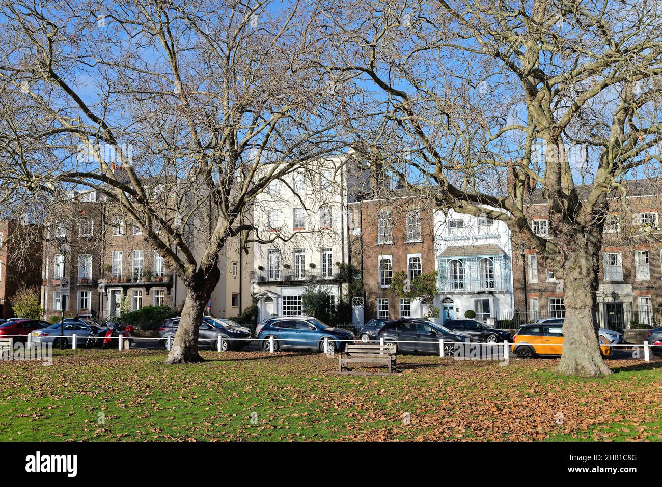Exclusive private residential homes on Kew Green on a sunny winters day West London England UK Stock Photo