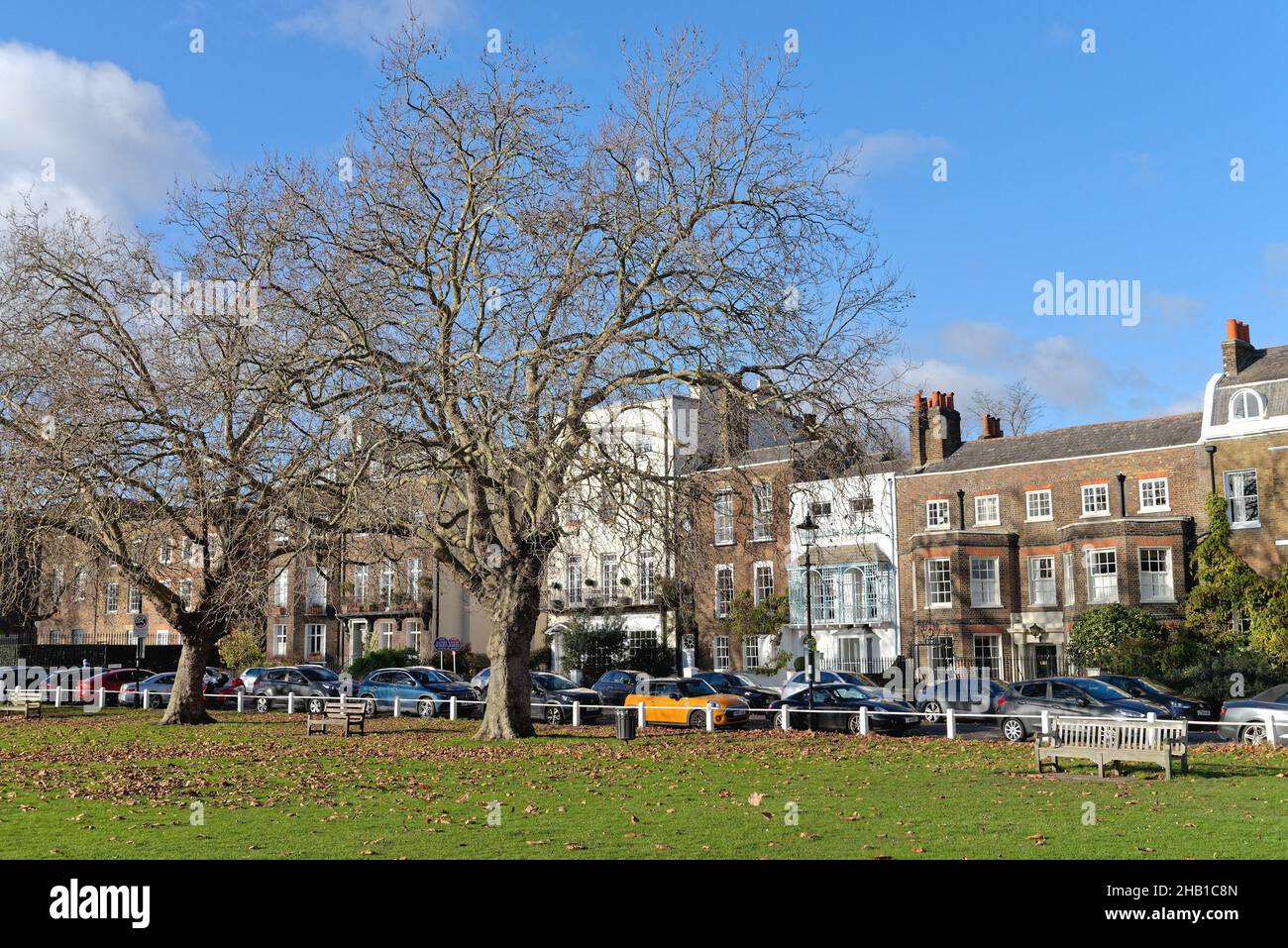 Exclusive private residential homes on Kew Green on a sunny winters day