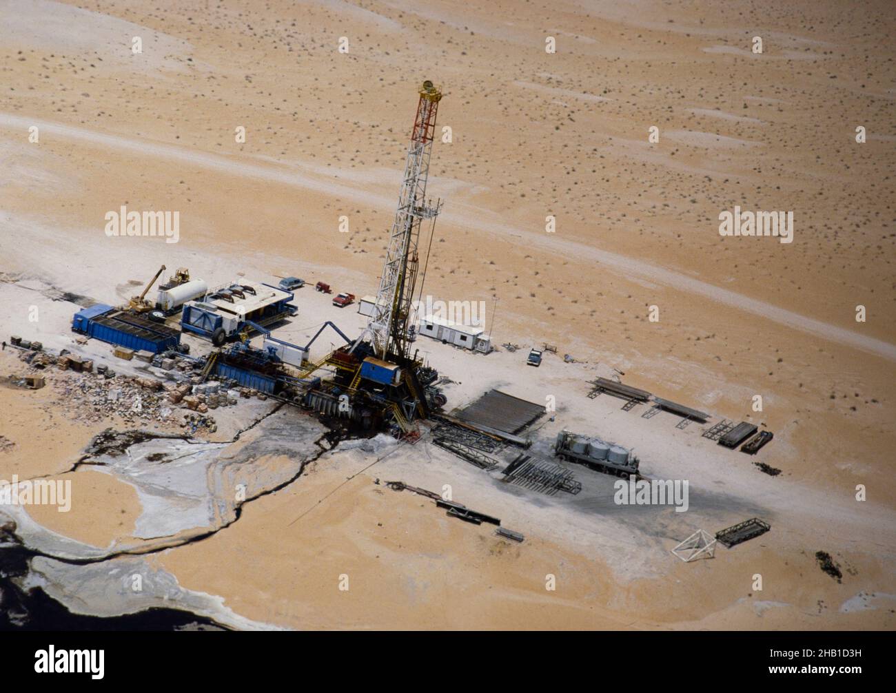 Oil industry in Ras Tanura area, Saudi Arabia, drilling rig in desert