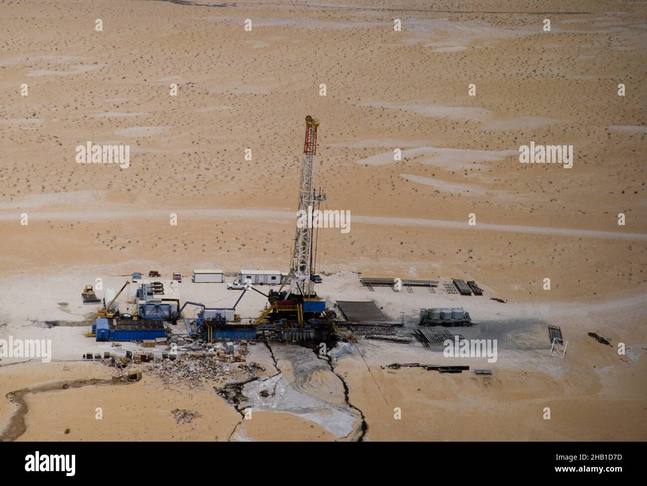 Oil industry in Ras Tanura area, Saudi Arabia, drilling rig in desert