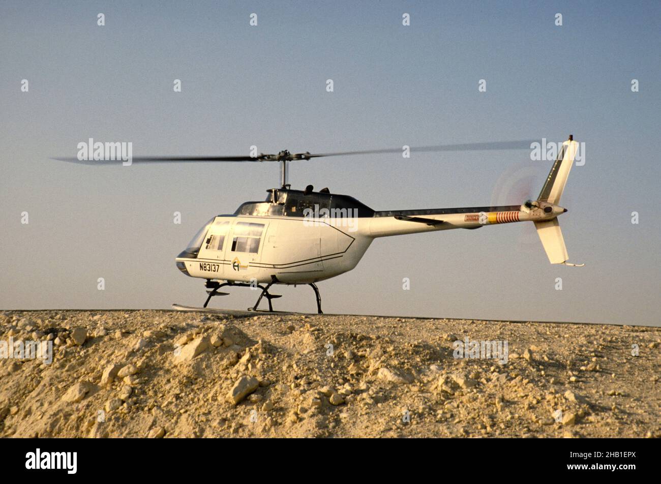 Oil industry in Ras Tanura area, Saudi Arabia, helicopter Bell 206 JetRanger 1979 Stock Photo