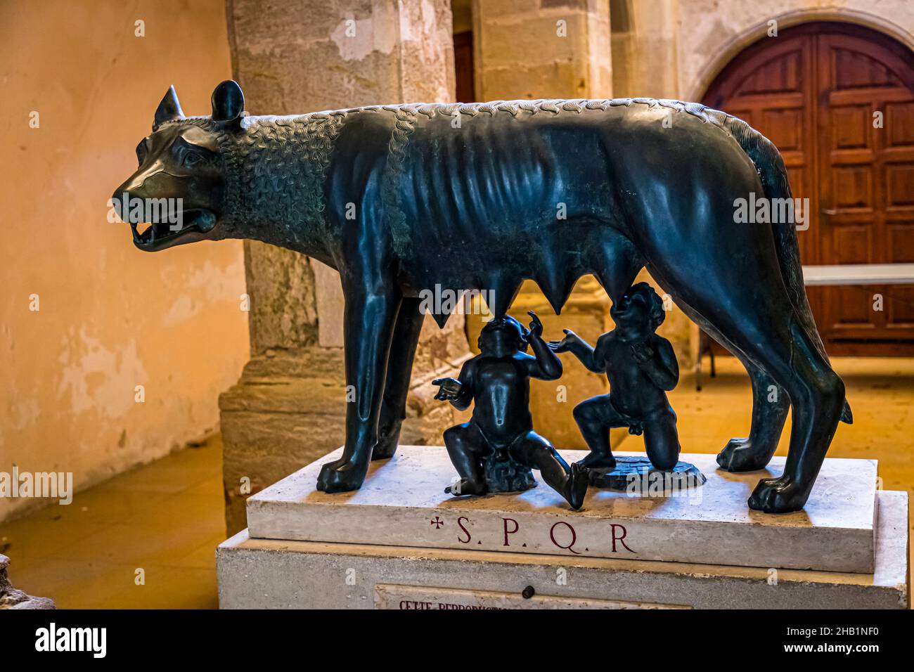 Replica of the sculpture S.P.Q.R. showing how a she-wolf suckles Romulus and Remus in Narbonne, France Stock Photo