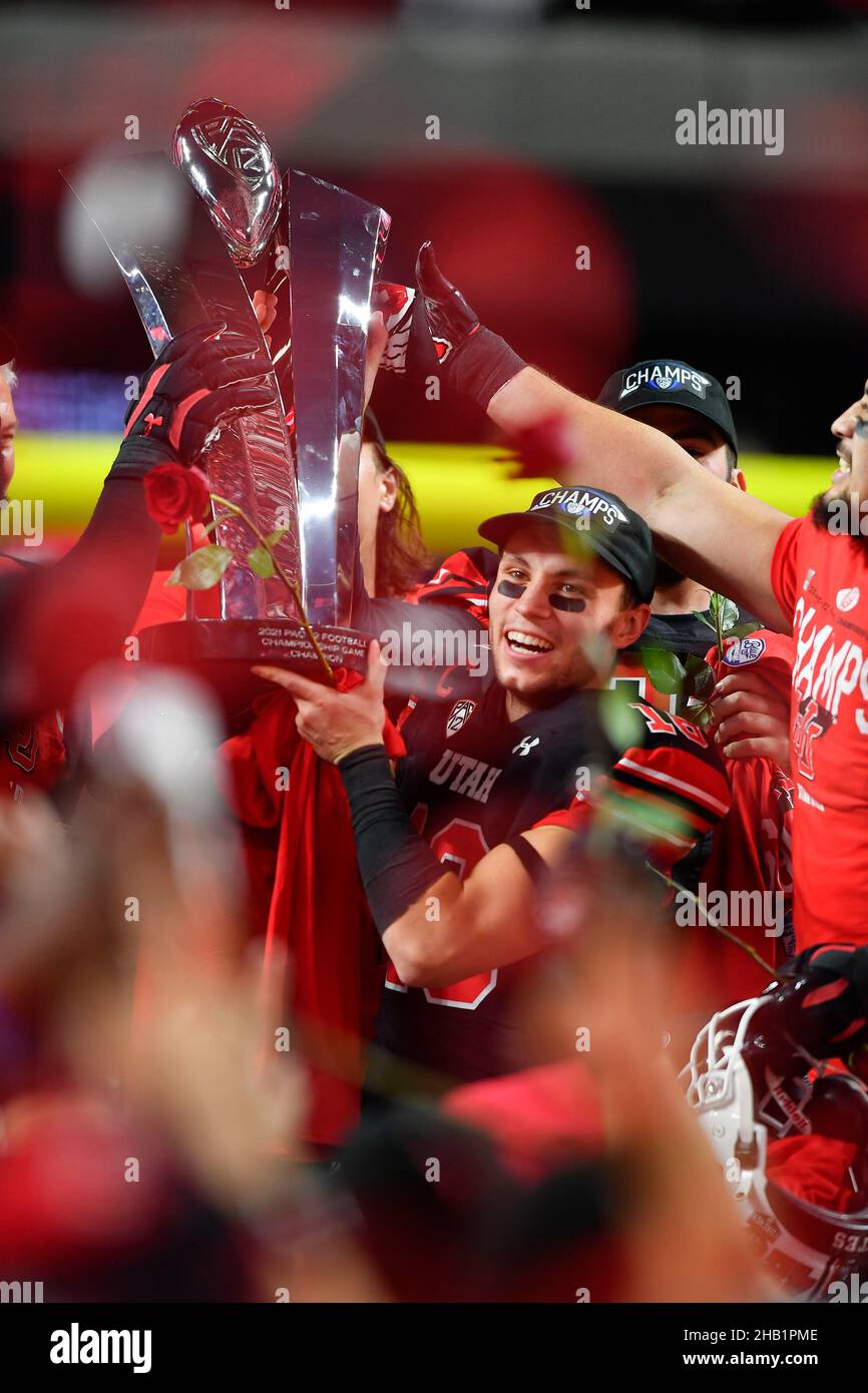 Utah Utes wide receiver Britain Covey (18) holding the conference title