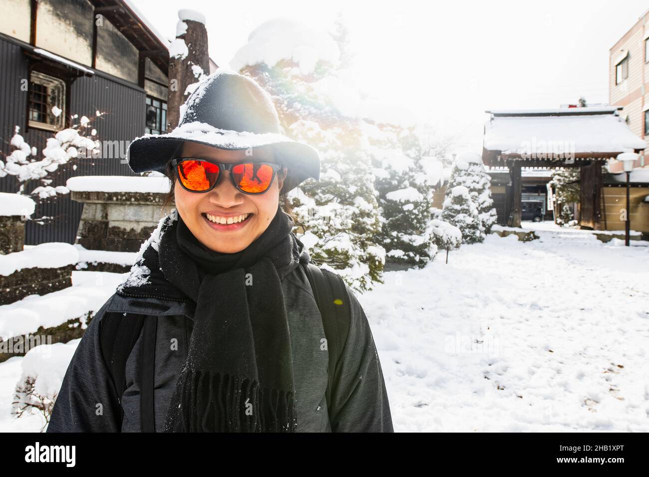 Woman exploring the town of Takayama in the winter Stock Photo
