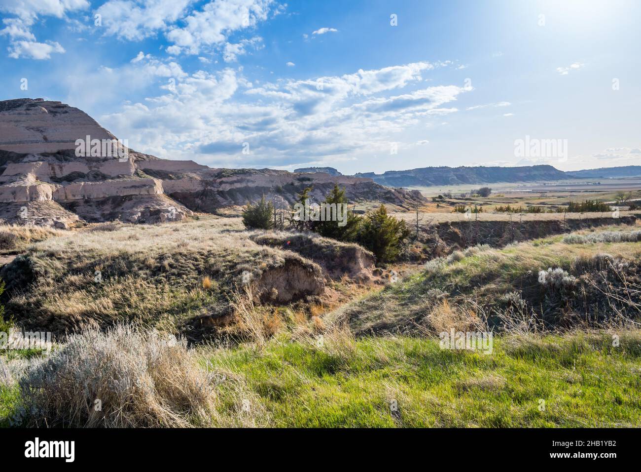 A natural rock formation of rugged badlands and towering bluffs Stock Photo