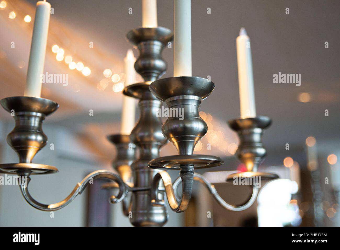 Decorative Brass candle lamp hanging from ceiling Stock Photo Alamy