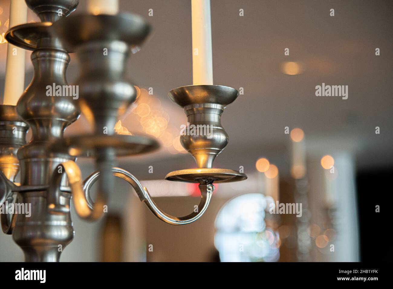 Decorative Brass candle lamp hanging from ceiling Stock Photo Alamy