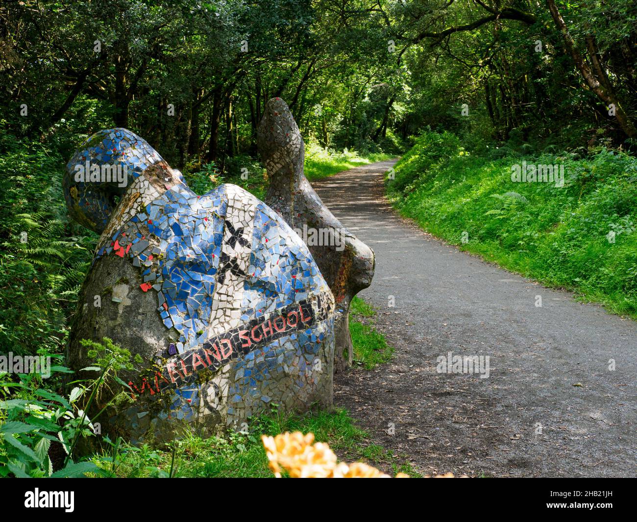 Mosaic sculpture seat made by children from Marland Primary School along the Tarka Trail, Devon, UK Stock Photo