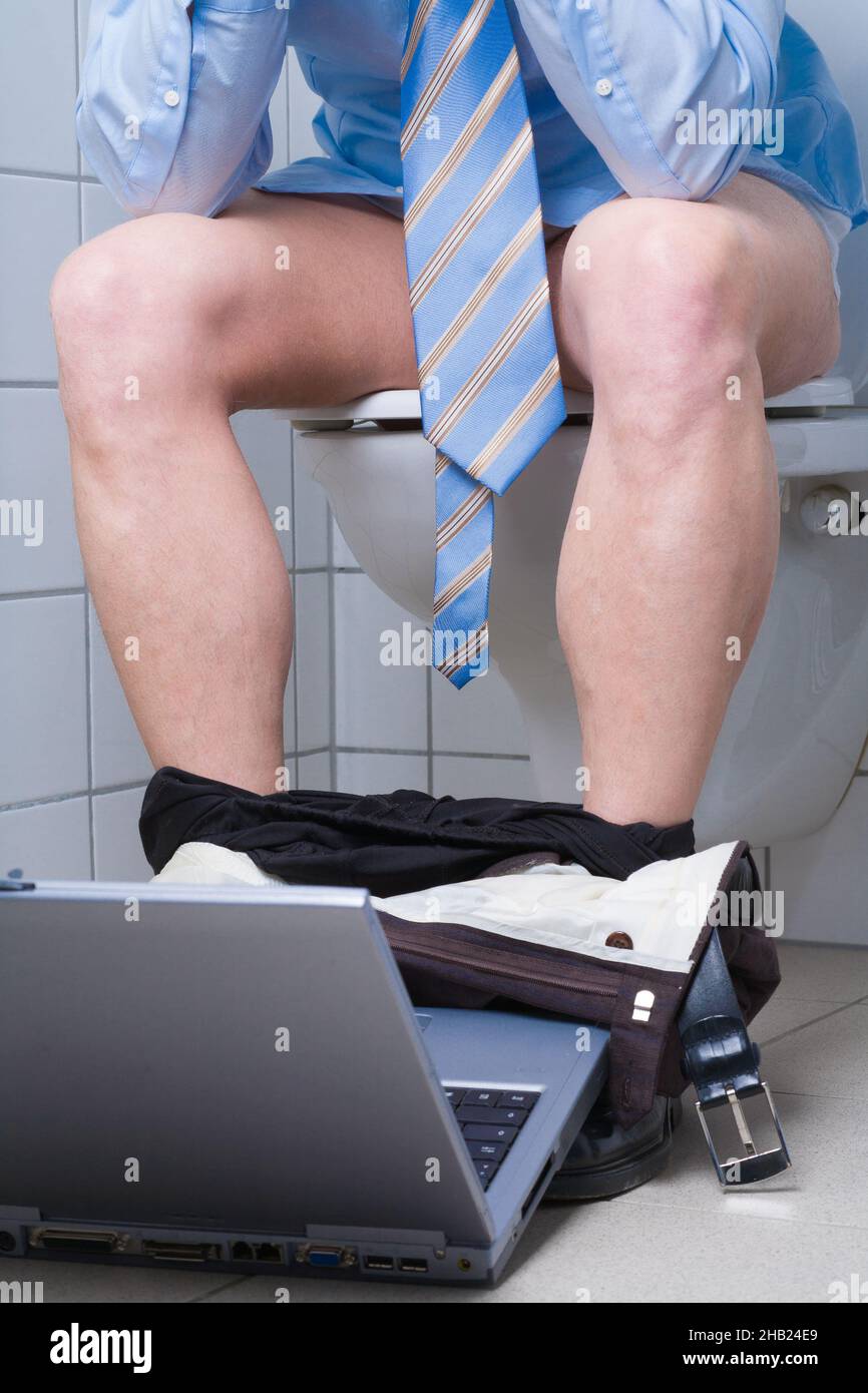 withdrawn, workaholic, toilet, sitting, notebook, laptop, business, office, home, businessman, office, bathroom, toilet, work, down, stress, quiet, ma Stock Photo