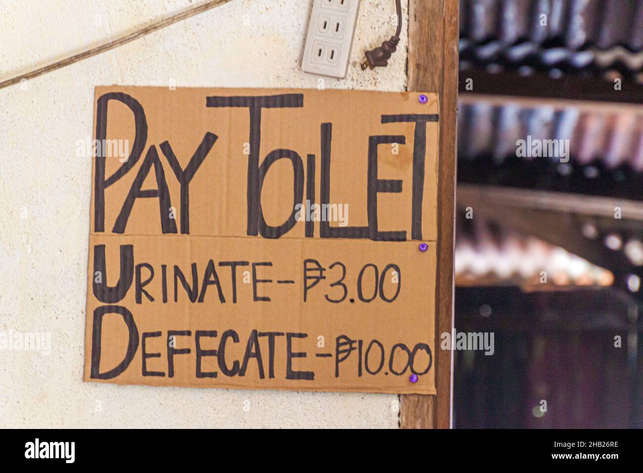 Sign Pay Toilet in Banaue village, Luzon island, Philippines Stock