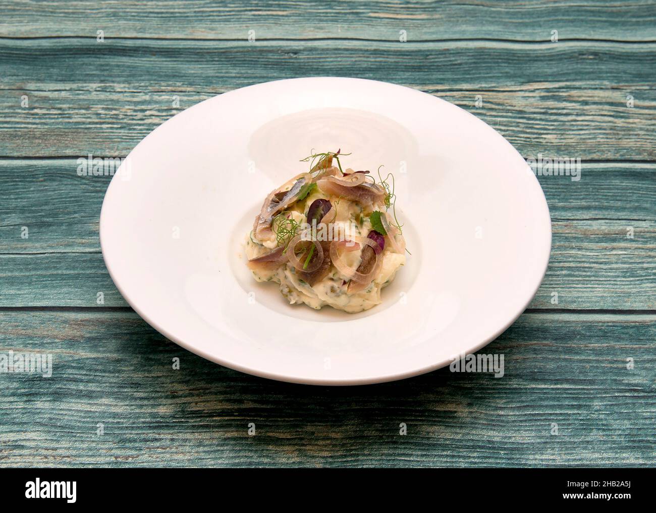 Sardinas y ensalade de patata...Spanish Tapas dishes Stock Photo