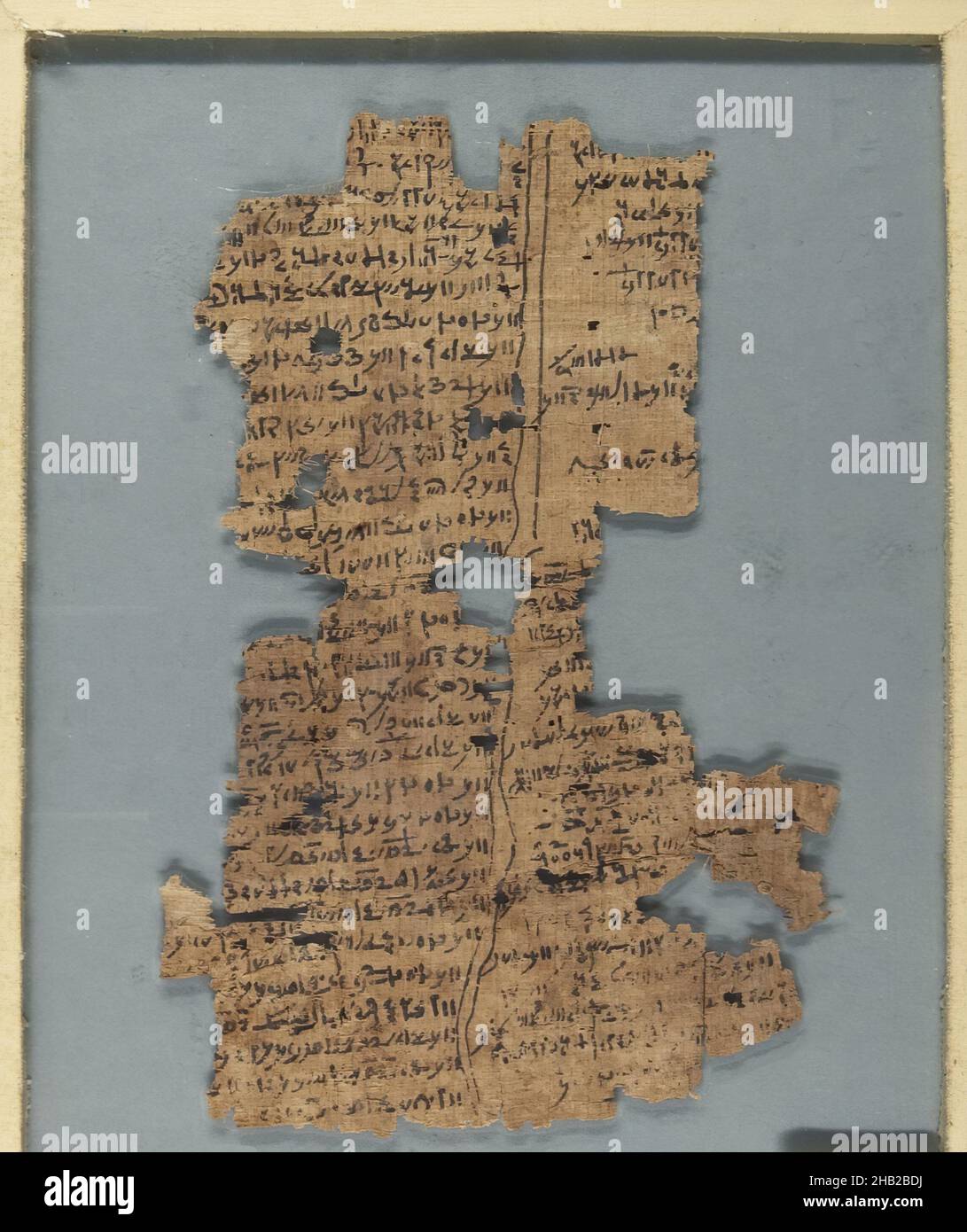 Papyrus Fragments Inscribed in Demotic or Greek, Papyrus, ink, 2nd century C.E., Roman Period, a: Glass: 8 1/16 x 10 1/16 in., 20.5 x 25.5 cm Stock Photo