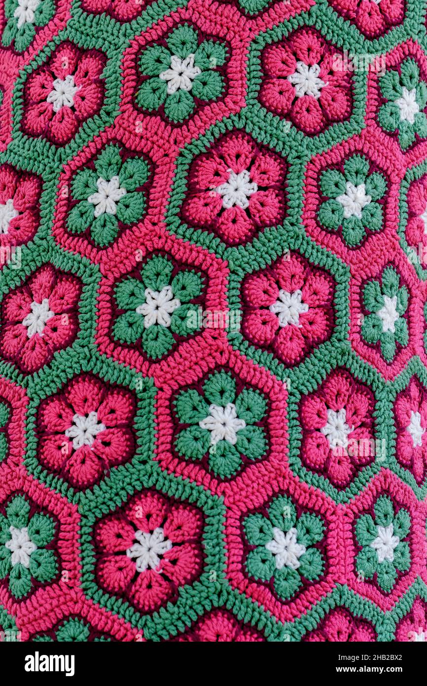 Vivid multi colored background of beautiful knitted threads displayed ...