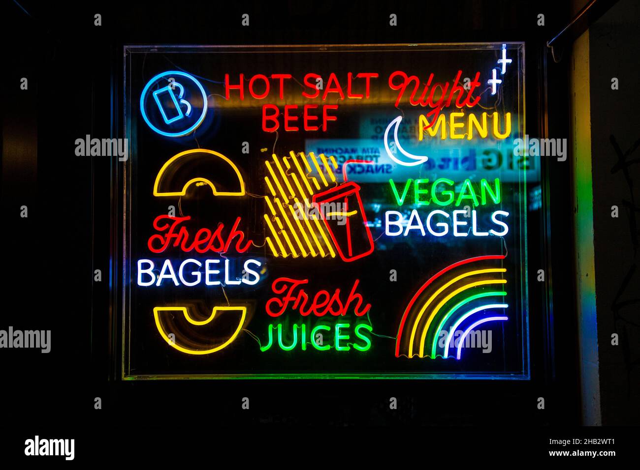 Neon sign at Bagel Bakery Bar in Soho, London, UK Stock Photo