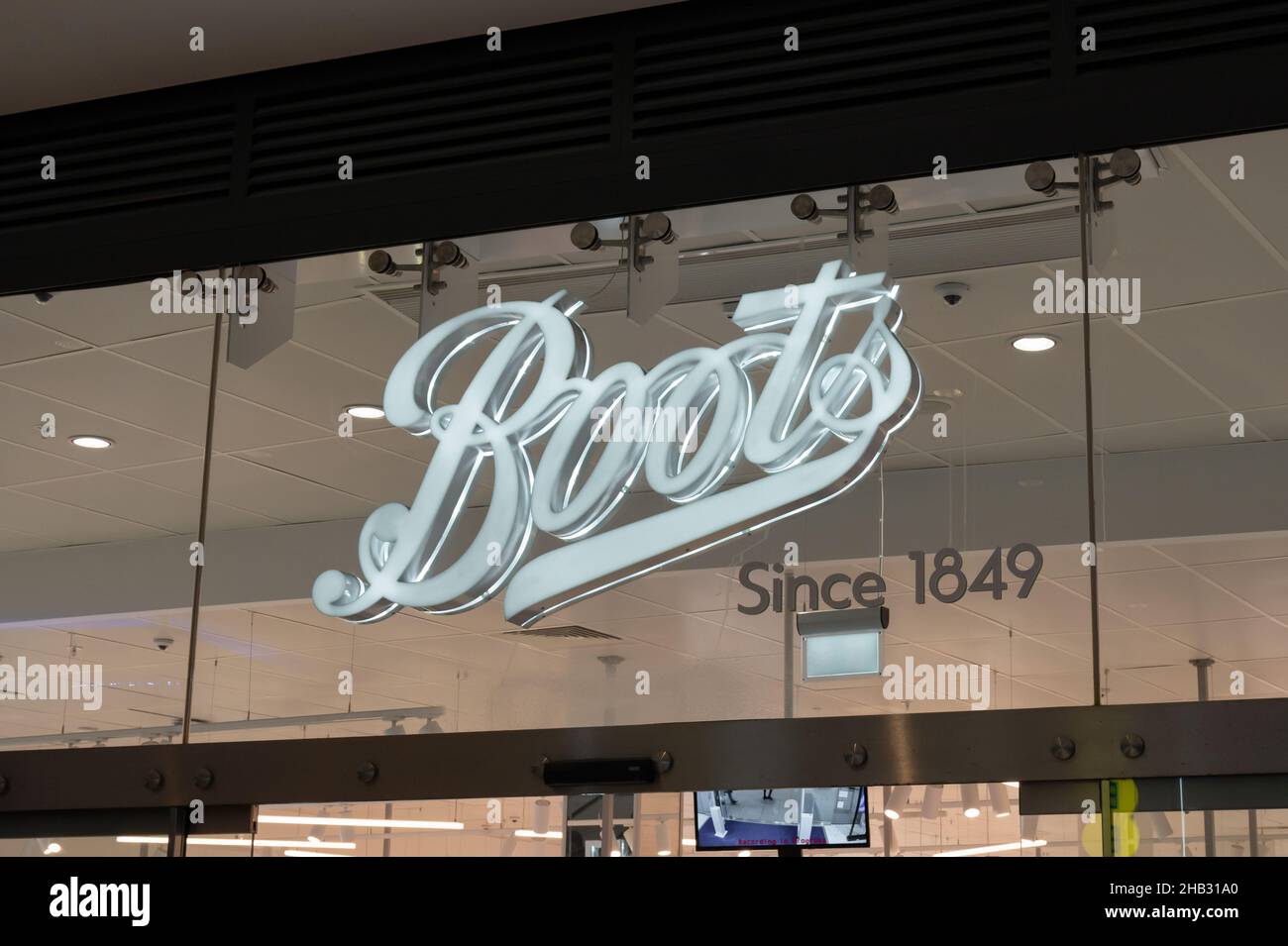 Edinburgh, Scotland- Nov 21, 2021:  The sign for Boots store in Edinburgh. Stock Photo