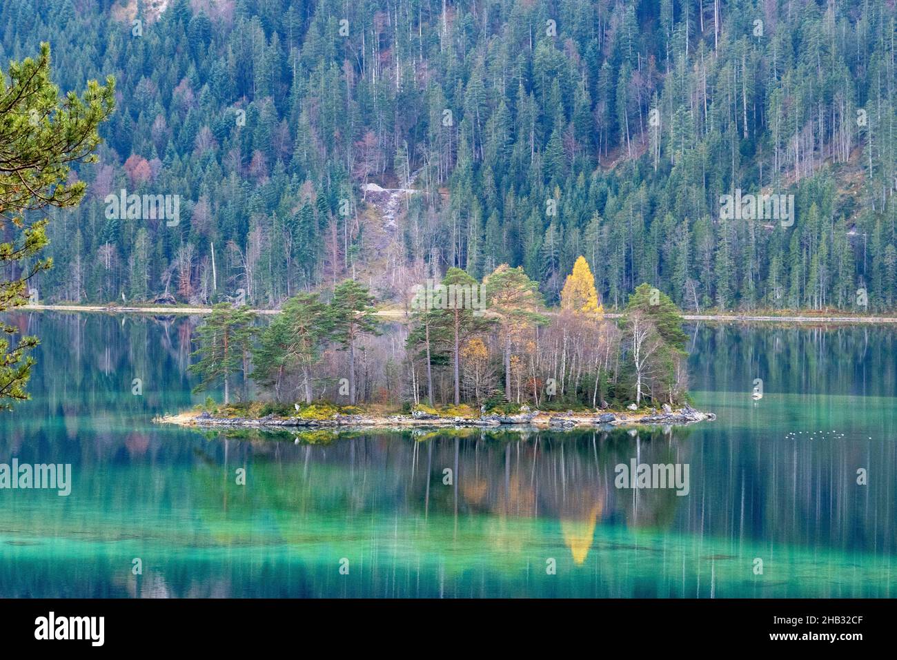 An island on the Eibsee a mountain lake in the German Alps Stock Photo ...