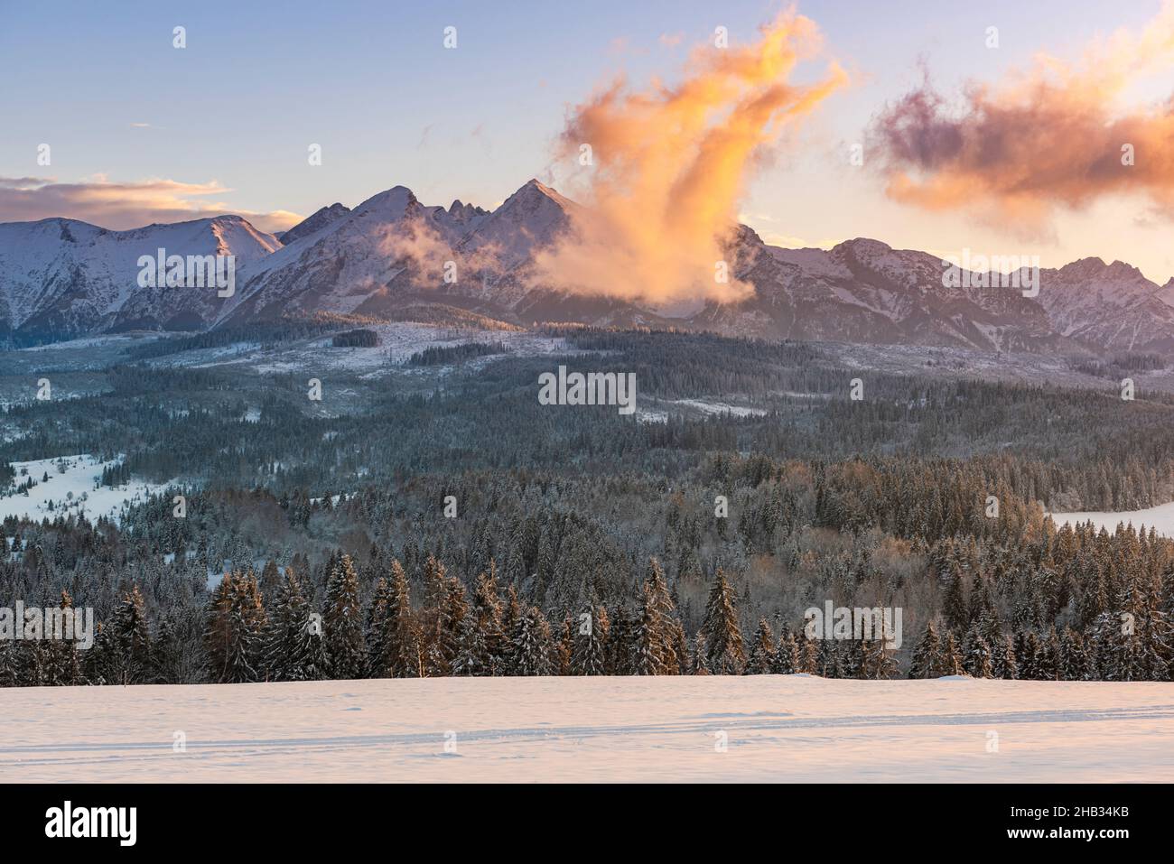 Sunset in Tatra Mountains at Snowy Winter Season Stock Photo - Alamy