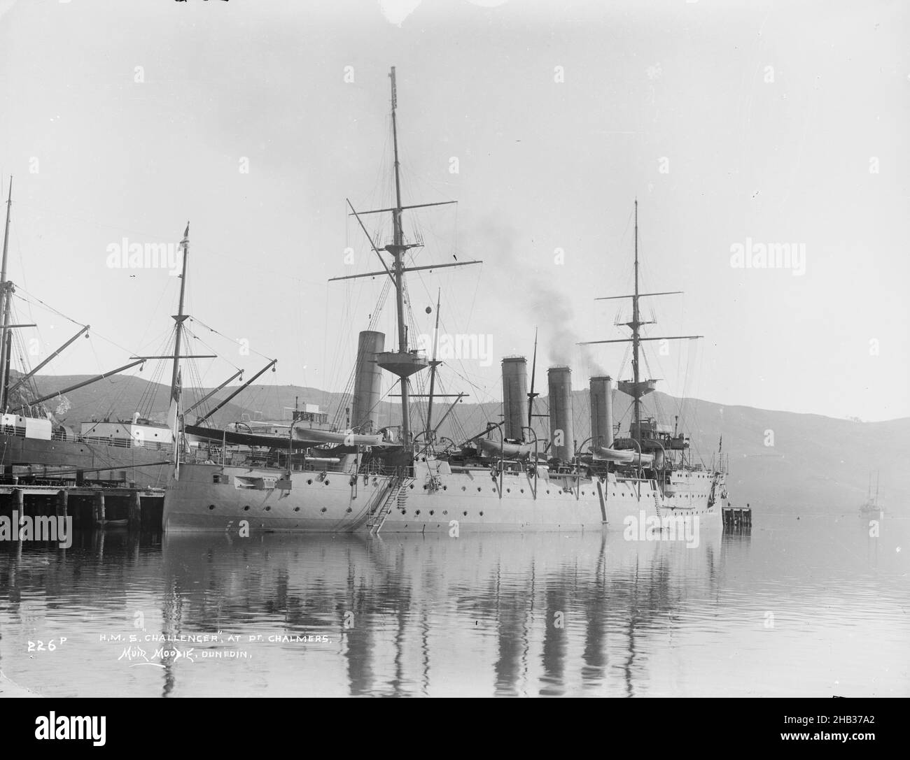 H.M.S. Challenger at Port Chalmers, Muir & Moodie studio, photography studio, New Zealand, black-and-white photography Stock Photo