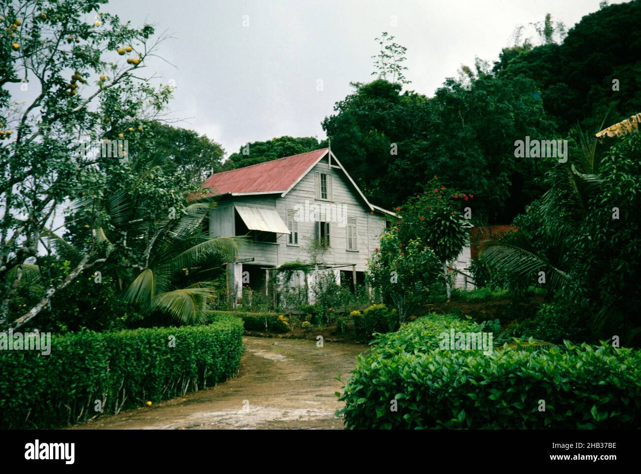 Historic architecture wooden house with corrugated iron roof of cocoa