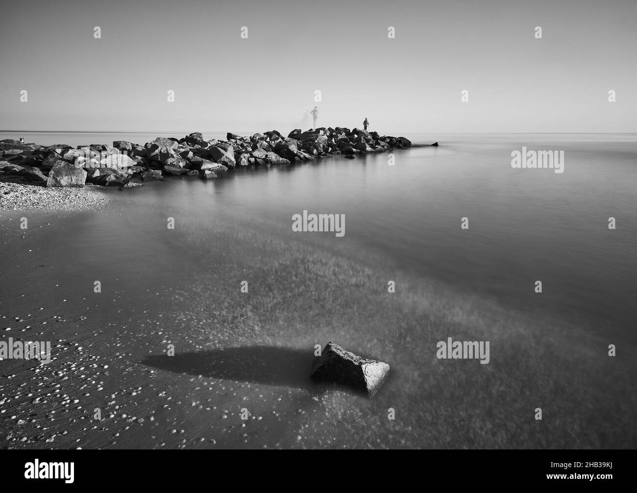 Long exposure photo of beach in the evening, black and white Stock Photo