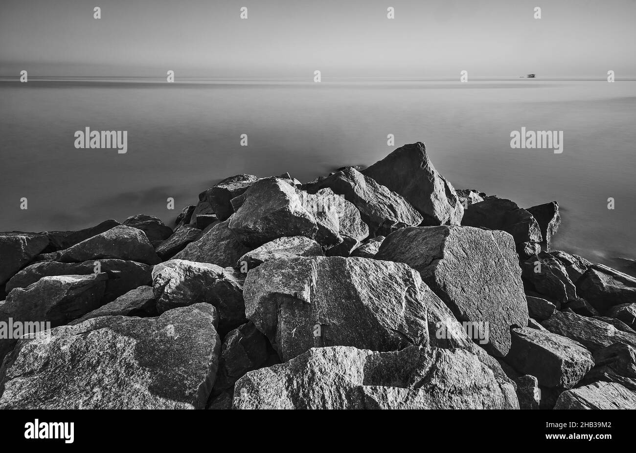 Long exposure photo of beach in the evening, black and white Stock Photo