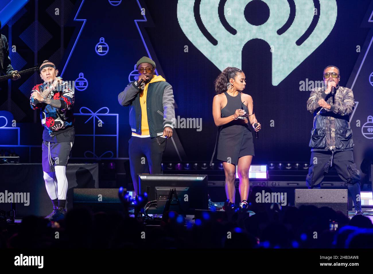 December 14, 2021, Washington, D.C, USA: TABOO, WILL.I.AM,  J. REY SOUL and APL.DE.AP of the Black Eyed Peas perform at the Hot 99.5 Jingle Ball at Capital One Arena in Washington, D.C. (Credit Image: © Kyle Gustafson/ZUMA Press Wire) Stock Photo