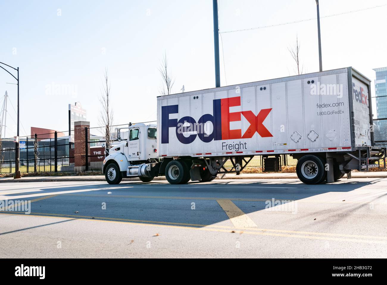 FedEx delivery truck in Chicago parked while making deliveries by the University of Chicago. Stock Photo