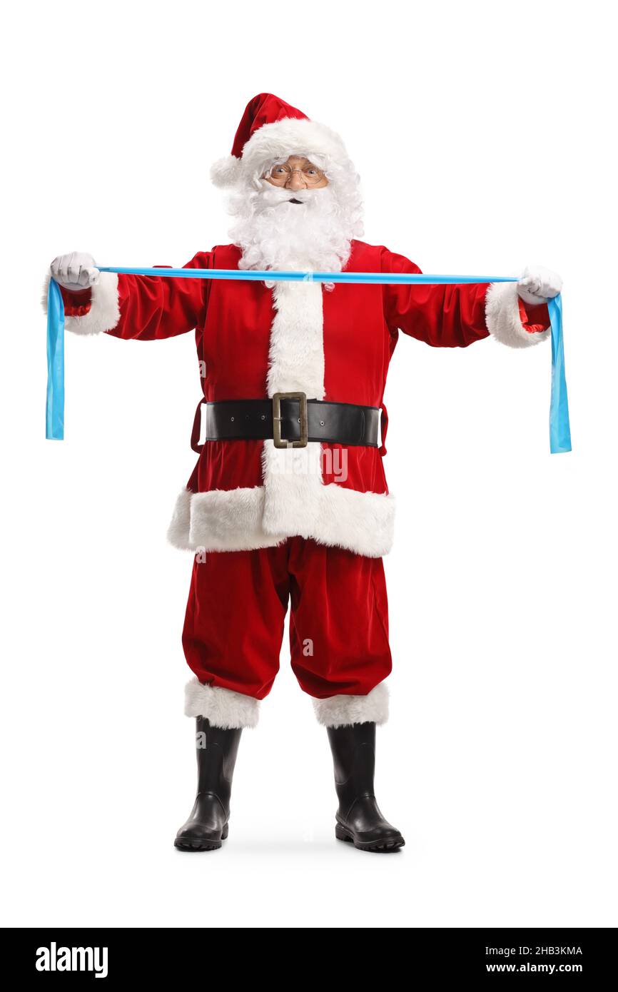 Stretch Santa Full length portrait of santa claus exercising with an elastic band ...