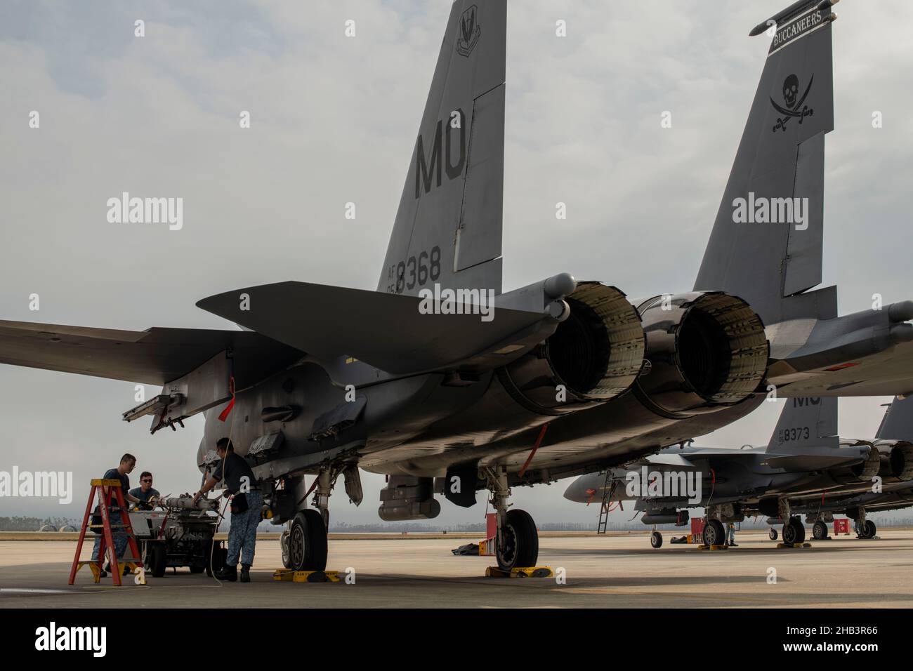 Republic of Singapore Air Force airmen assigned to the 428th Fighter Squadron, Mountain Home Air Force Base, Idaho, load a missile onto an F-15SG at Tyndall AFB, Florida, Dec. 8, 2021. The RSAF participated in the 53rd Weapons Evaluation Group’s Weapons System Evaluation Program 22.03, a premier joint event for combat aviators across the United States military to conduct live-fire weapons employment training and evaluation. (U.S. Air Force photo by Staff Sgt. Betty R. Chevalier) Stock Photo