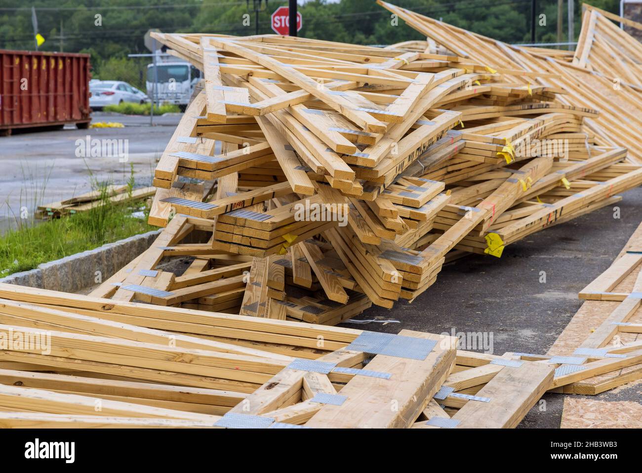 Stacker wooden material boards and beams for new house on of under