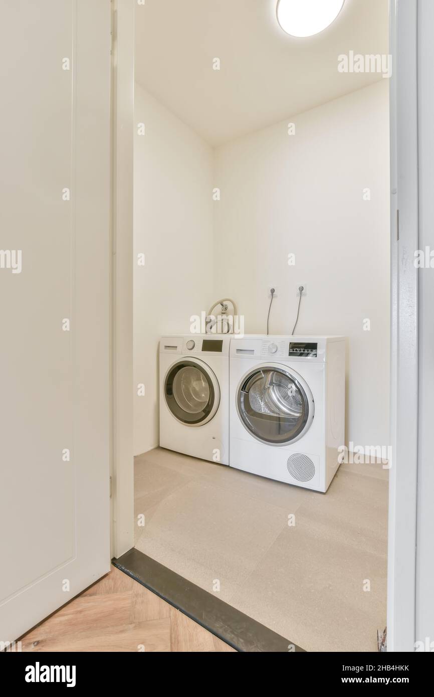 Laundry interior design in a luxury house Stock Photo - Alamy