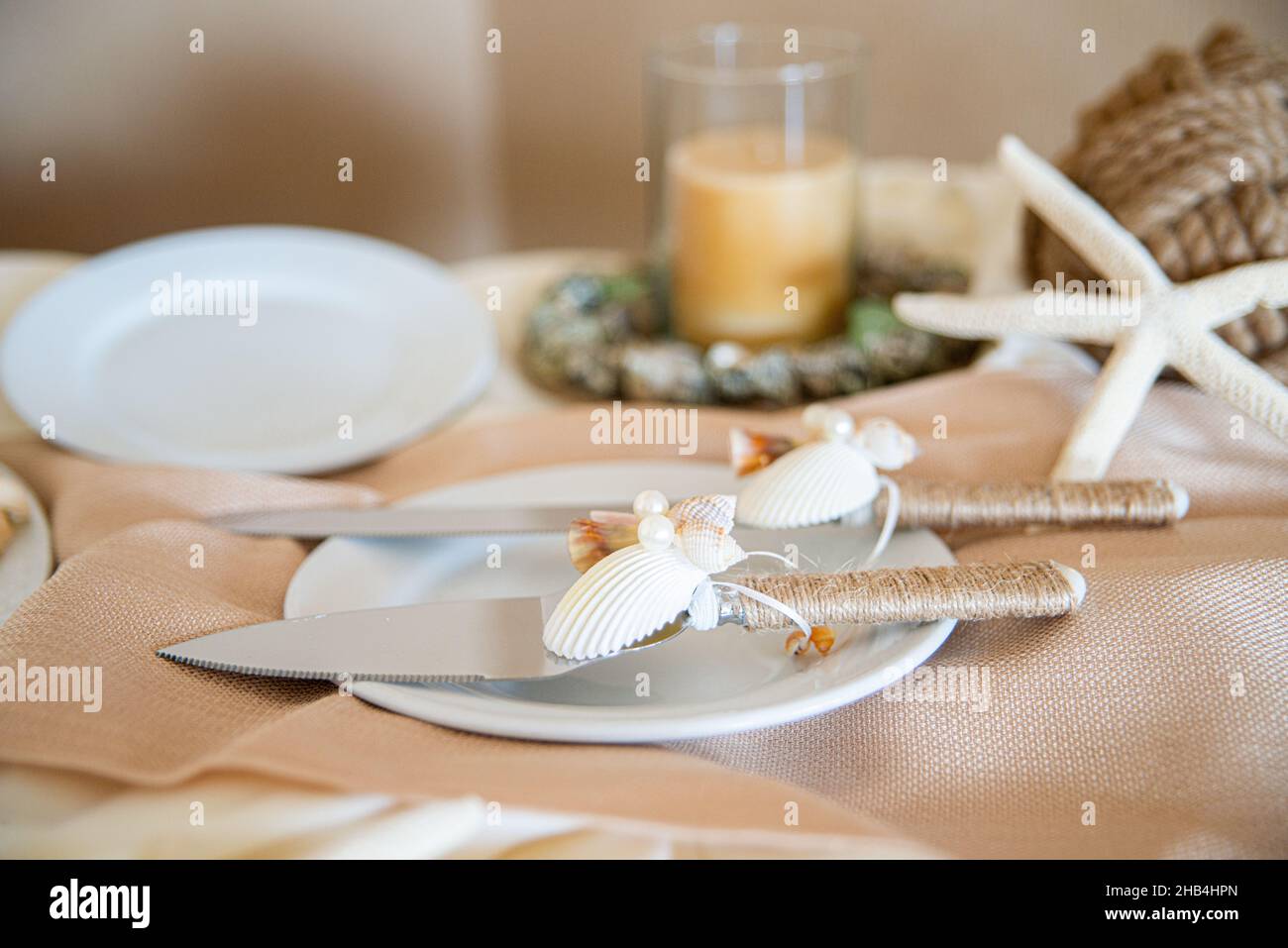 Whimsicle cake serving utensils decorated with seashells,starfish and