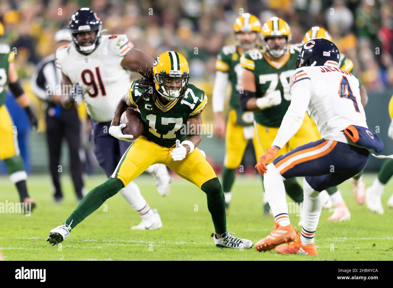 Green Bay, Wisconsin, USA. 12th Dec, 2021. Green Bay Packers wide receiver Davante Adams #17 tries to run past Chicago Bears free safety Eddie Jackson #4 during NFL football game between the Chicago Bears and the Green Bay Packers at Lambeau Field in Green Bay, Wisconsin. Packers defeated Bears 45-30. Kirsten Schmitt/CSM/Alamy Live News Stock Photo
