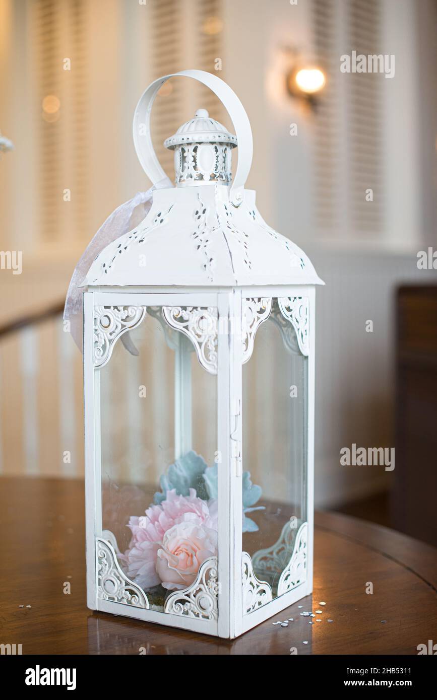 White candle lantern table centerpiece at country club Stock Photo Alamy